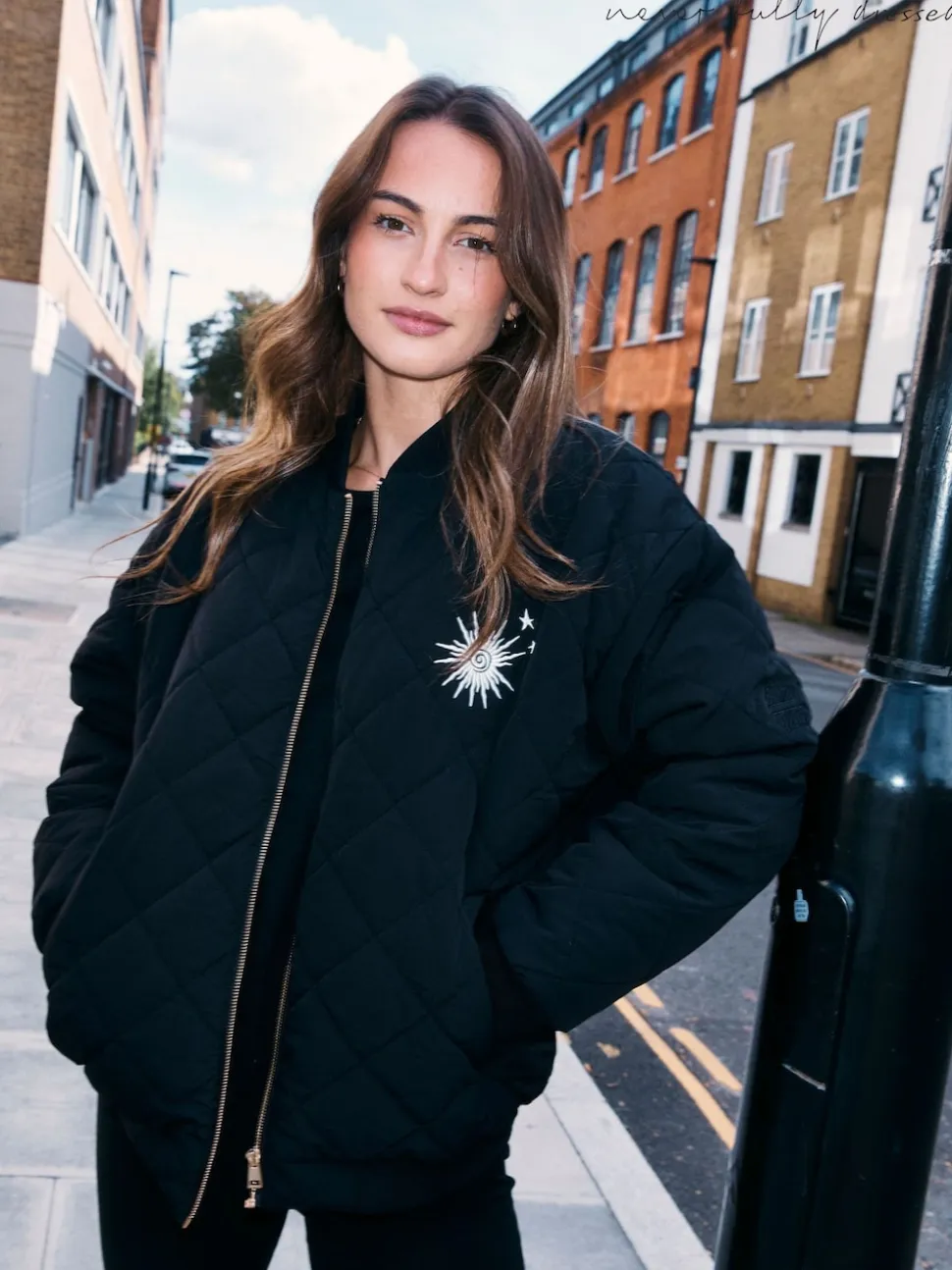 Blouson bomber matelassé doublé de fourrure Never Fully Dressed