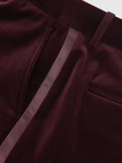 bordeaux - Pantalon évasé Reiss Elia à rayures style smoking en velours