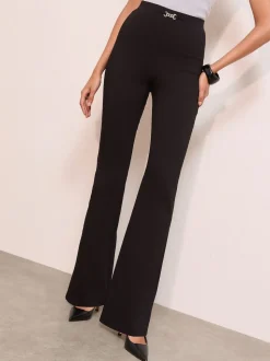 Bordure noire. - Pantalon évasé Friends Like These Sculpting extensible
