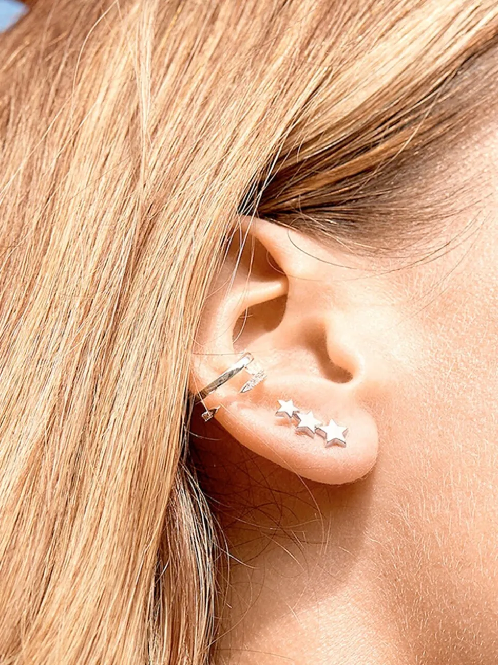 Boucles d'oreilles Estella Bartlett ornées de trois étoiles