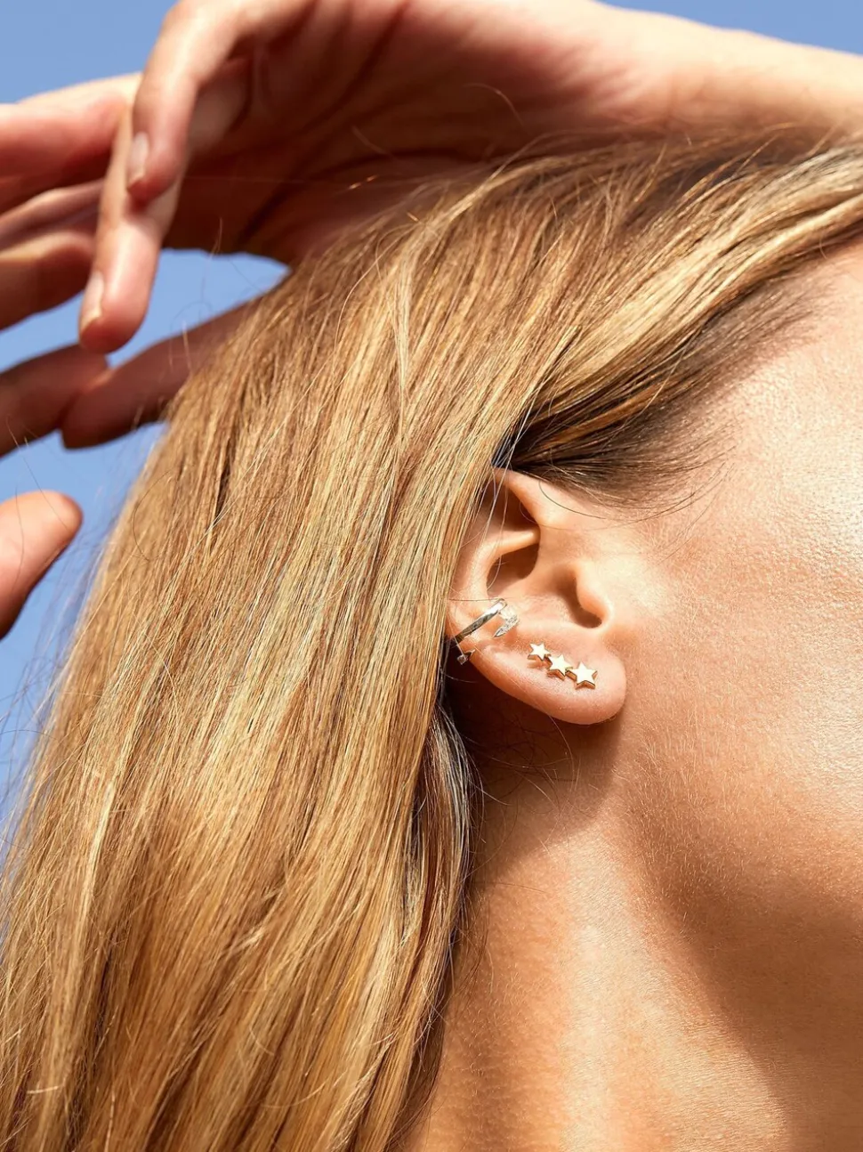Boucles d'oreilles Estella Bartlett ornées de trois étoiles