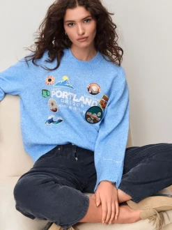 Broderie avec écusson bleu clair - Pull en maille à col rond en laine