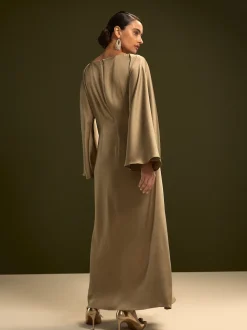 Champagne doré - Robe longue en satin à manches longues torsadée sur le devant
