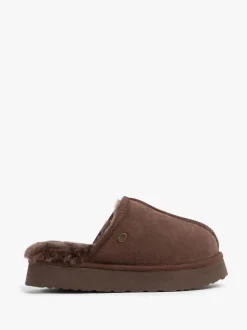 Chaussons Just Sheepskin Mabel en peau de mouton à plateforme marron pour femme