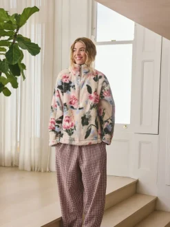 Crème fleuri - Polaire en imitation peau de mouton à col zippé