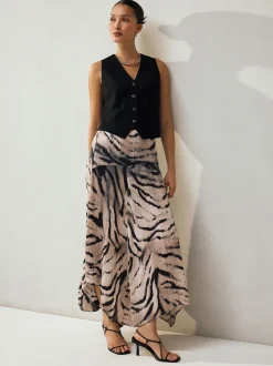 Écru imprimé zèbre - Jupe mi-longue asymétrique en satin effet froissé
