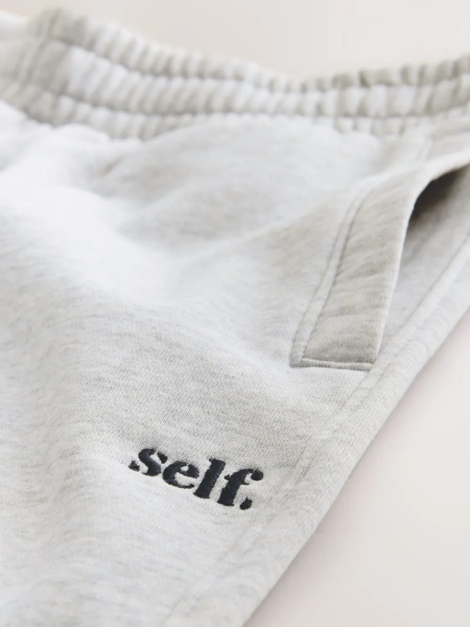 Gris - soi-même. Pantalon de jogging coupe large