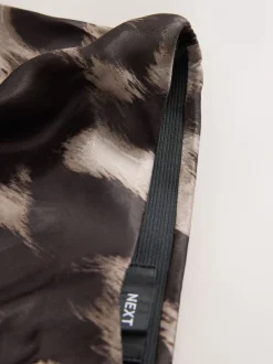 Impression animale brune - Jupe Midi Satin