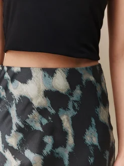 Impression animale verte - Jupe Midi Satin