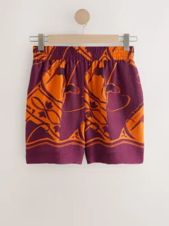Imprimé bordures exotiques orange/bordeaux - Short de villégiature à taille élastique