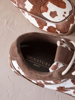 Imprimé vache - Baskets slim en cuir haut de gamme à lacets
