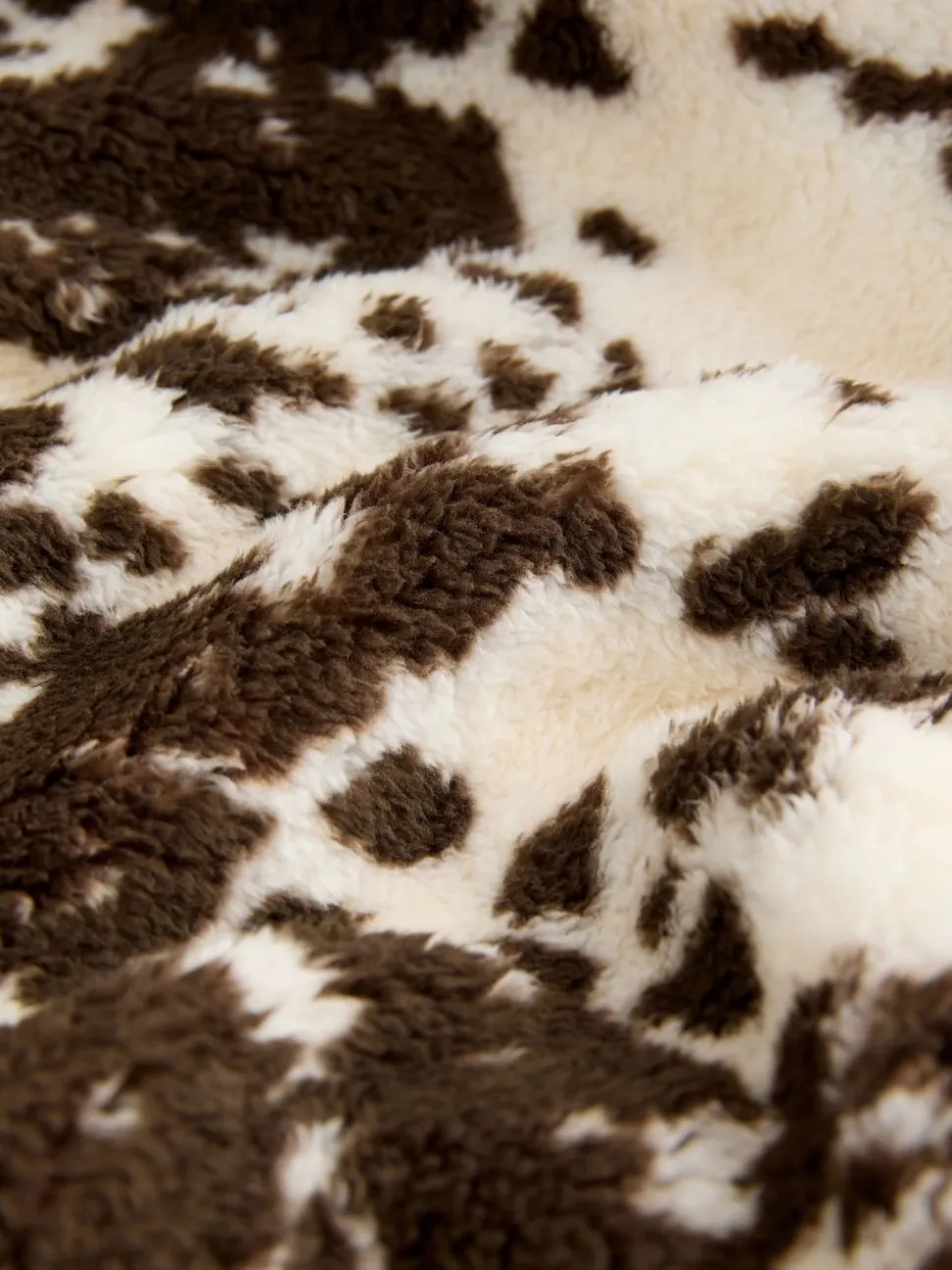 Imprimé vache Marron - Polaire en imitation peau de mouton à col zippé