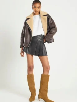 Jupe courte River Island plissée en similicuir en détresse