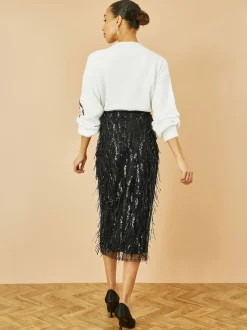Jupe mi-longue ajustée Yumi à sequins suspendus