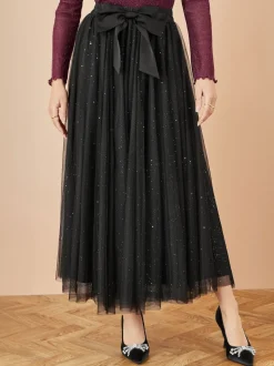 Jupe Yumi en tulle en maille filet scintillante avec nœud en satin