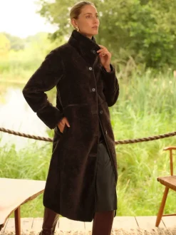 Manteau Love & Roses mi-long en shearling à liserés