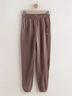 Marron - soi-même. Jogging à poignets