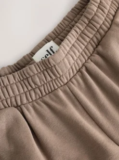 Marron mink - soi-même. Pantalon de jogging coupe large