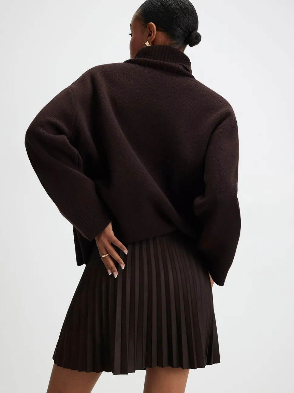 Mini-jupe plissée River Island en suédine à boutons