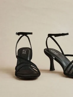 Noir - Sandales à talons à lanières Linzi Reflect coupe large