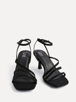 Noir - Sandales à talons à lanières Linzi Reflect coupe large