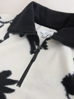 Noir/blanc à fleurs - Polaire à col zippé