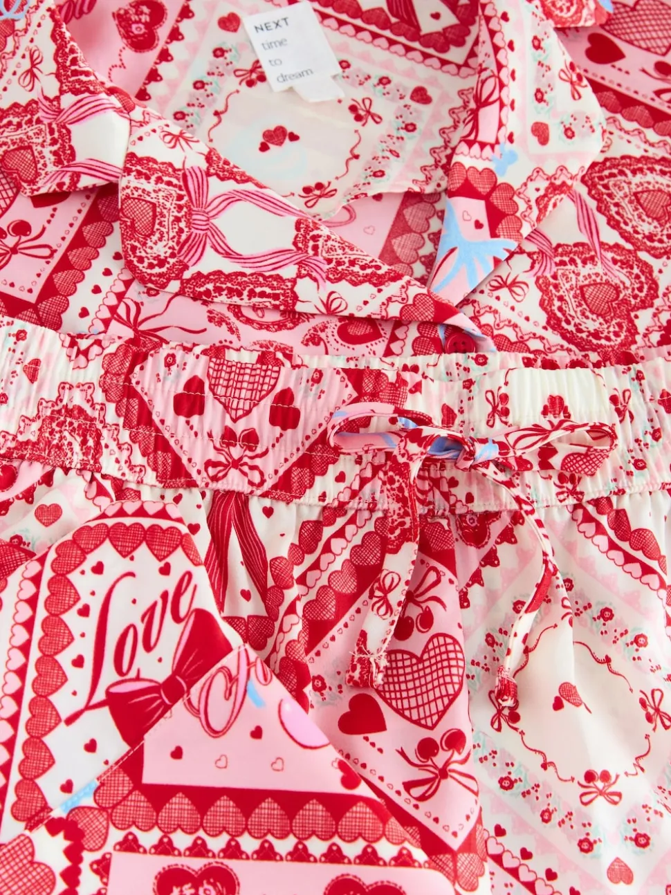Nœuds roses - Pyjama boutonné en satin