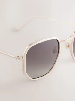 os - Lunettes de soleil rondes en métal