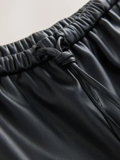 Pantalons Nothing Ordinary à rayures latérales en similicuir