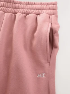 Rose - soi-même. Pantalon de jogging coupe large