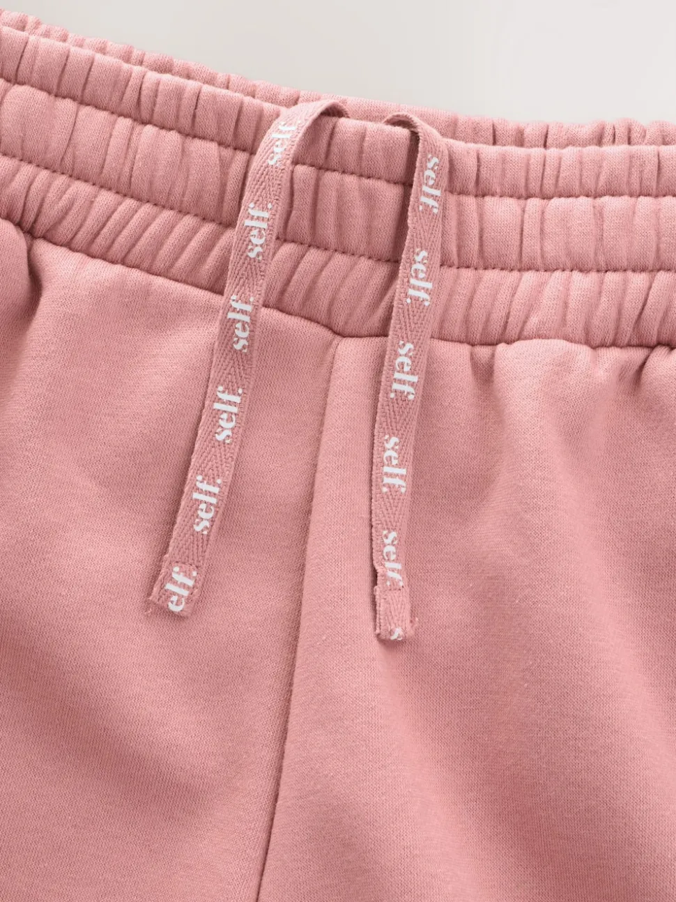 Rose - soi-même. Pantalon de jogging coupe large
