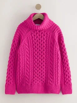 Rose vif - Pull long torsadé à col roulé en laine