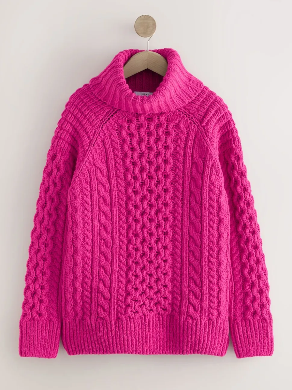 Rose vif - Pull long torsadé à col roulé en laine