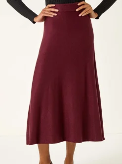 Rouge - Jupe mi-longue Roman en maille brillante