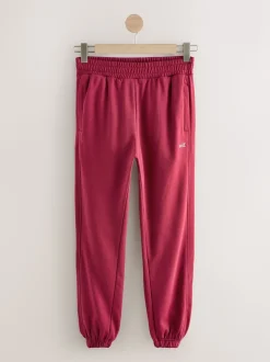 Rouge - soi-même. Jogging à poignets