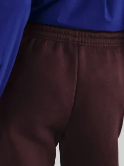 Rouge - Survêtement ample Nike Vêtements de sport Phoenix en polaire taille haute