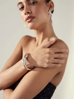 Tonalité argentée - Bracelet rigide croisé