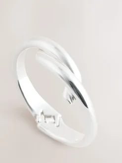 Tonalité argentée - Bracelet rigide croisé