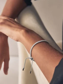 Tonalité argentée - Bracelet extensible à pierres baguettes
