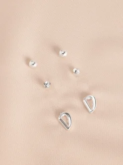 Tonalité argentée - Lot de boucles d’oreilles initiales