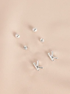 Tonalité argentée - Lot de boucles d’oreilles initiales