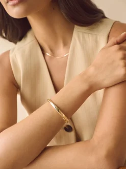 Tonalité d'or - Bracelet torsadé