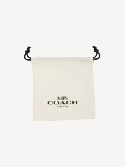 Tonalité d'or - COACH Boucles d’oreilles Signature C Huggie