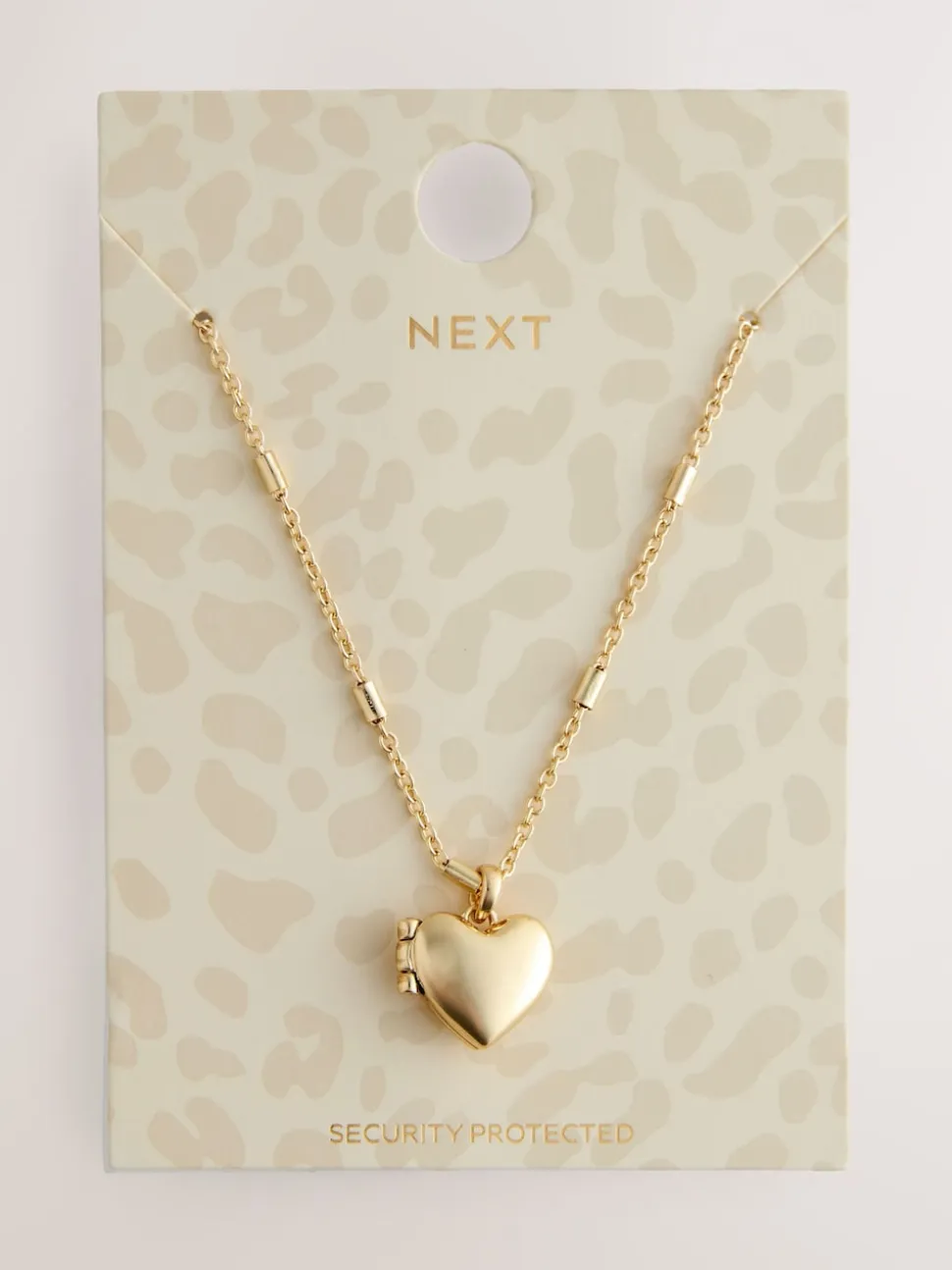 Tonalité d'or - Collier à médaillon cœur