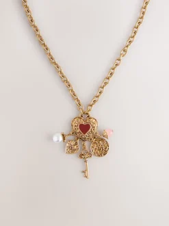 Tonalité d'or - Collier long à breloque cœur en grappe