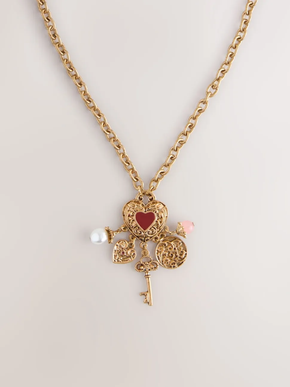 Tonalité d'or - Collier long à breloque cœur en grappe
