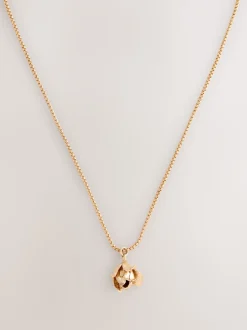 Tonalité d'or - Collier long à fleurs