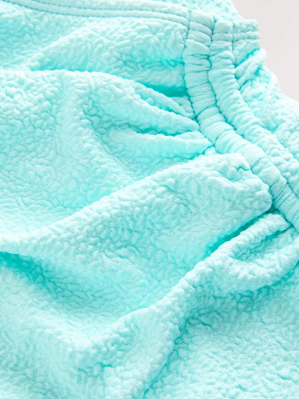 Vert menthe texturé - Maillot de bain gainant le ventre froncé